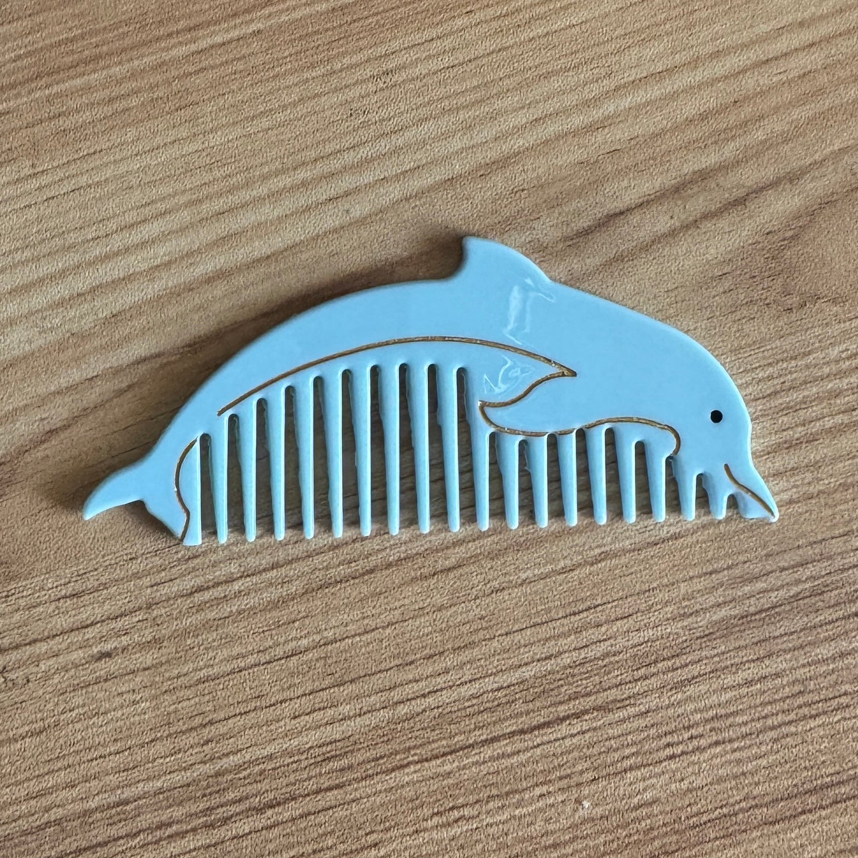 Dolphin Comb