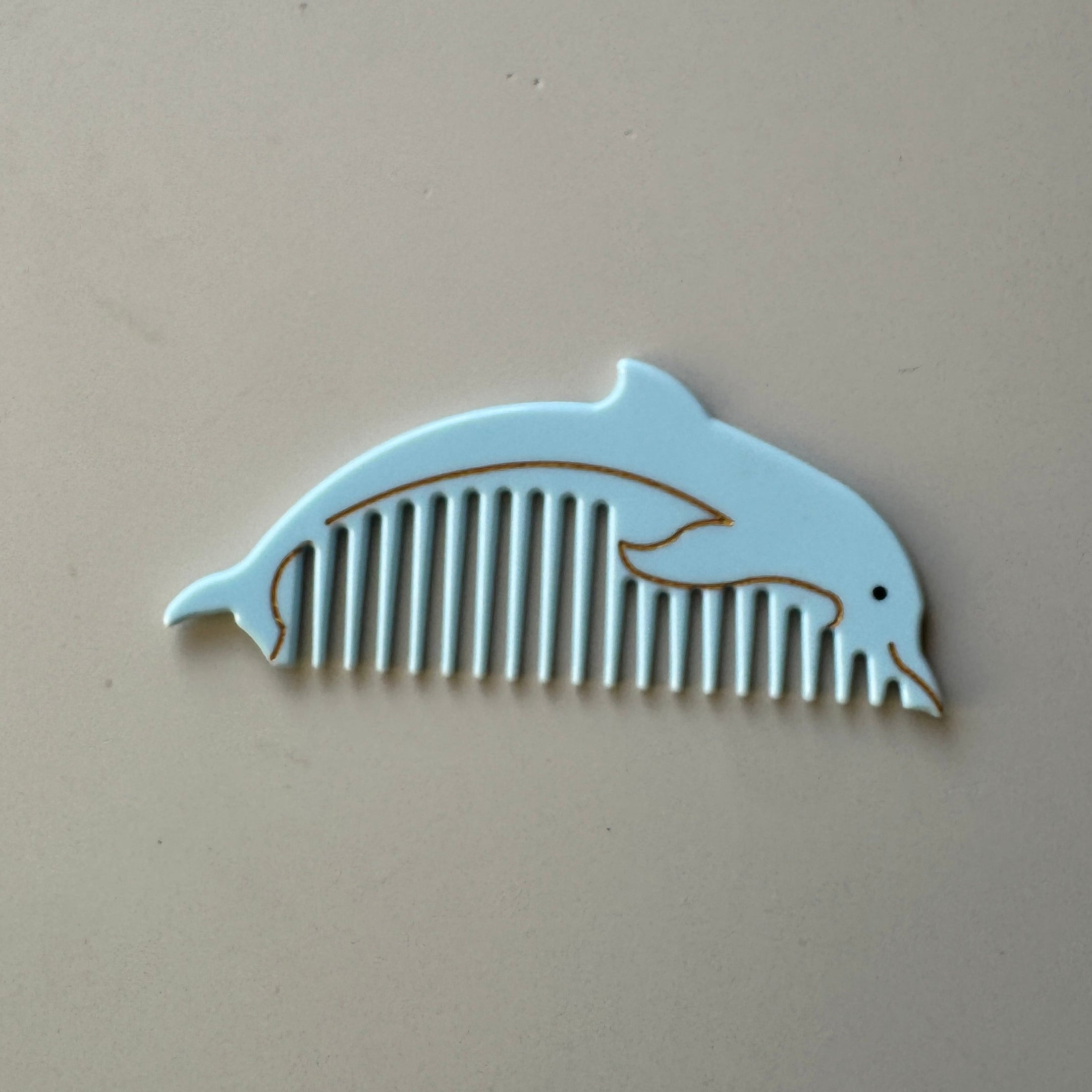 Dolphin Comb