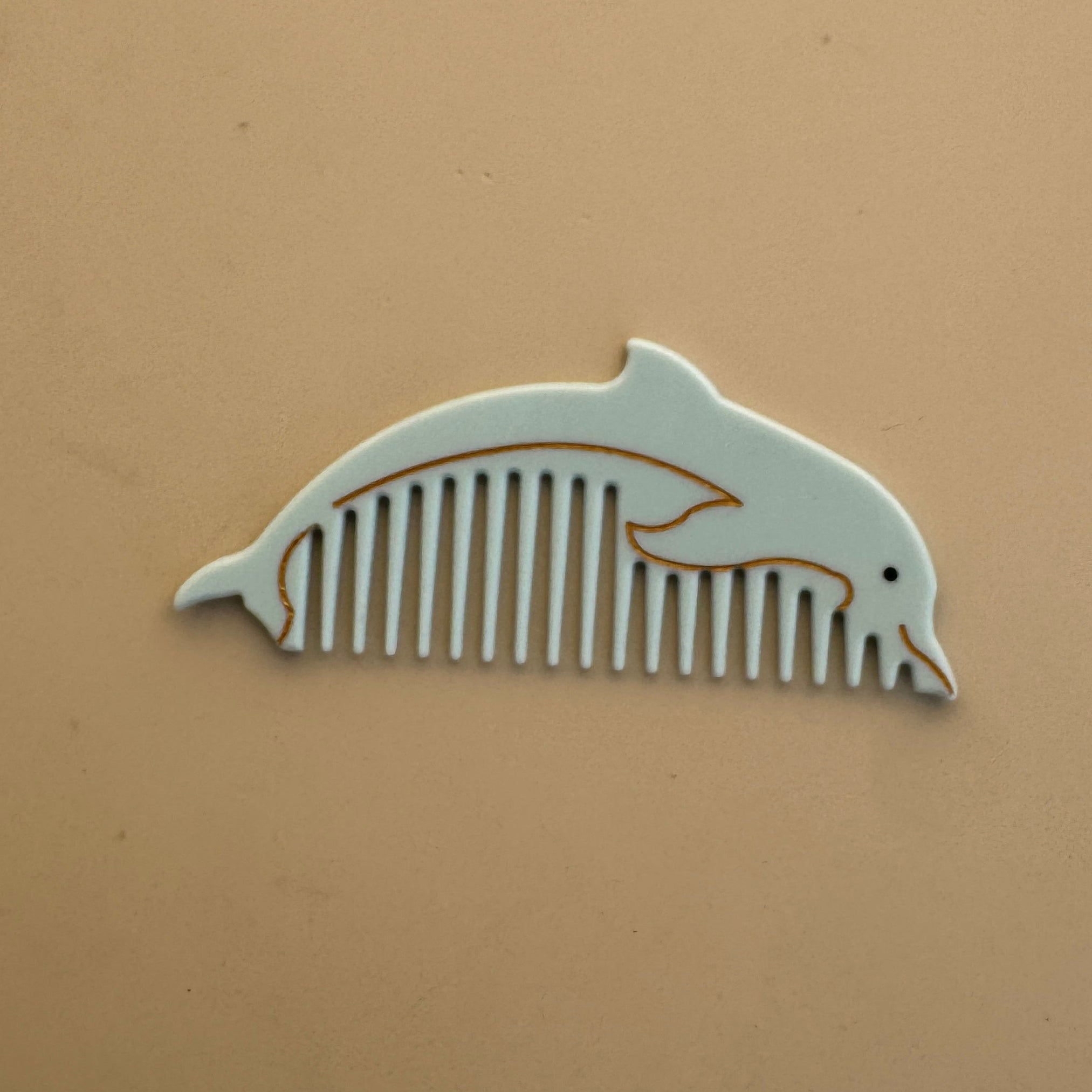 Dolphin Comb
