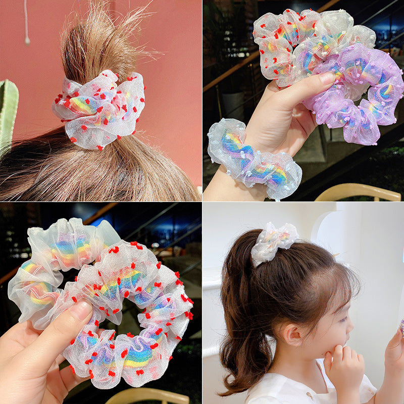 Red flowers around rainbow scrunchie