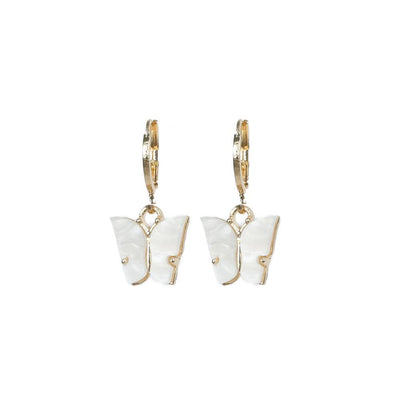 Butterfly Effect Huggies earrings within Pink